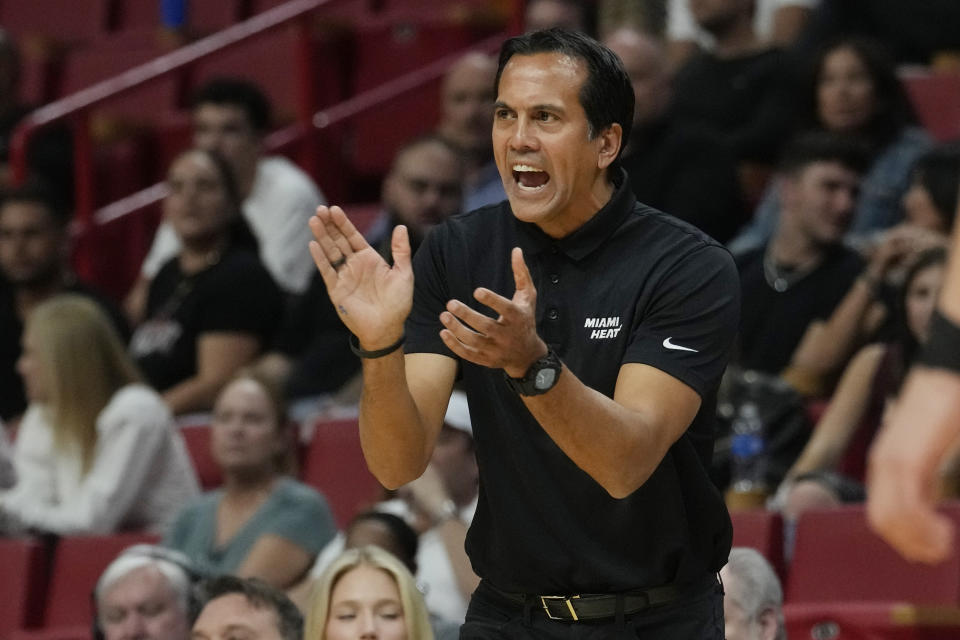 Miami Heat head coach Erik Spoelstra encourages the team during the second half of an NBA preseason basketball game against the Brooklyn Nets, Wednesday, Oct. 18, 2023, in Miami. (AP Photo/Marta Lavandier)