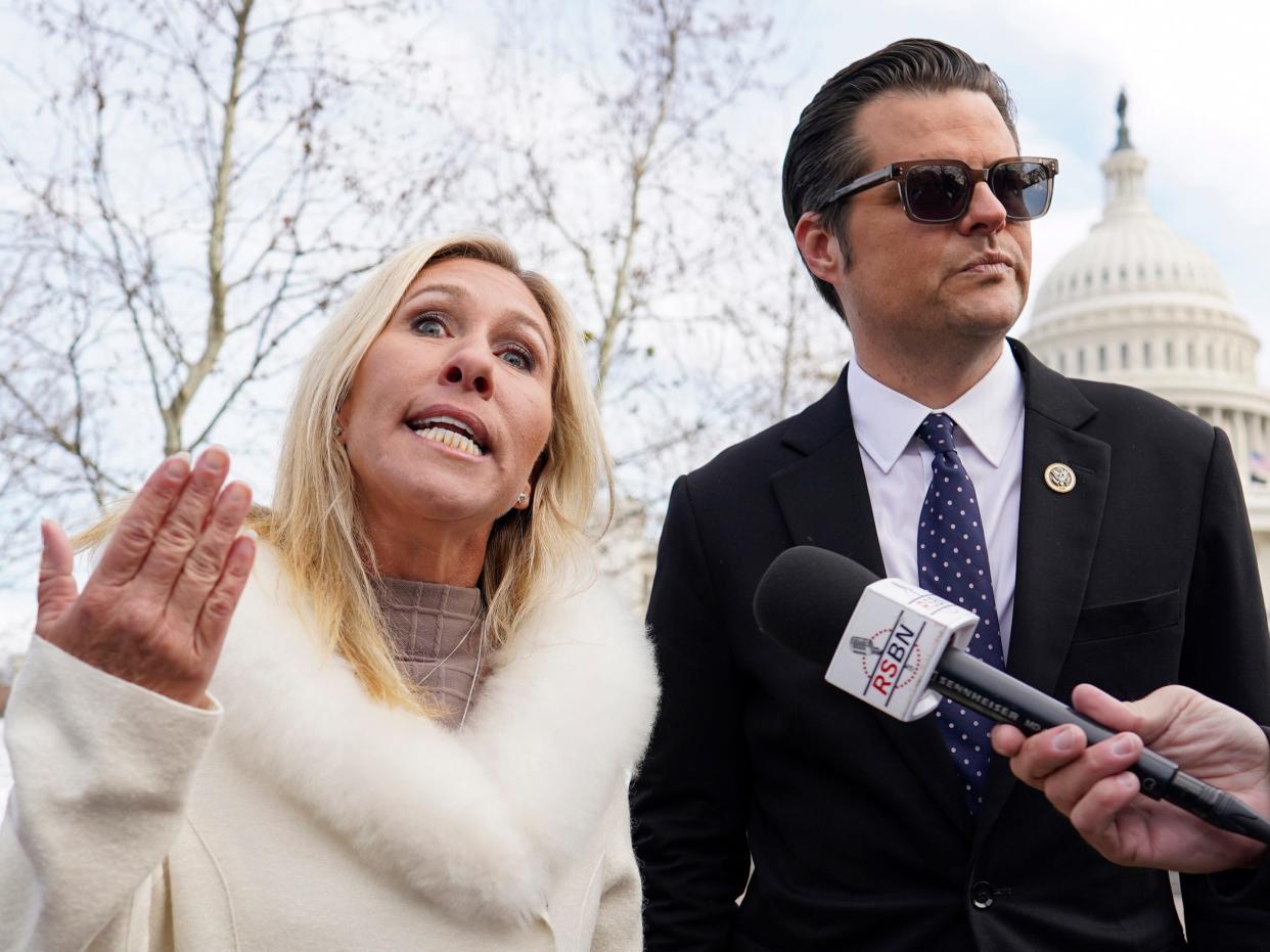 Reps. Matt Gaetz and Marjorie Taylor Greene speak outside the US Capitol on January 6, 2022.