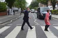 <p>Britain’s Prime Minister David Cameron walks accross the pedestrian crossing outside Abbey Road studios with former minister Tessa Jowell (R) in London, Britain, May 20, 2016. (Jeremy Selwyn/REUTERS) </p>