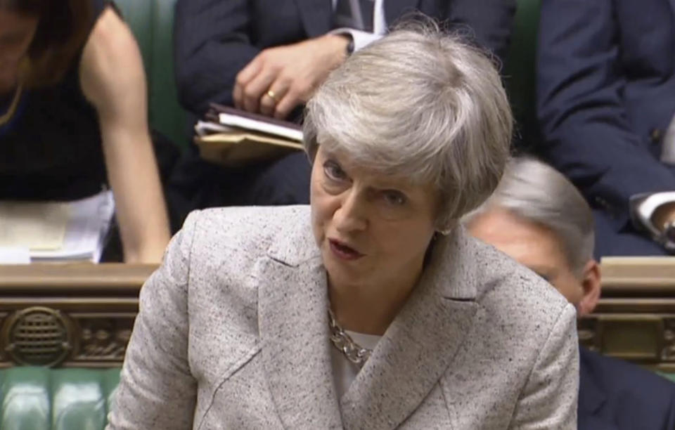 British Prime Minister Theresa May speaking in the House of Commons about the Brexit split from Europe, in London Thursday Nov. 22, 2018. Addressing the House of Commons after publication of a draft political declaration on post-Brexit relations with the EU, May faced wide-ranging criticism from skeptical lawmakers Thursday. (PA via AP)