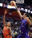 Phoenix Mercury center Brittney Griner, right, block the shot of Connecticut Sun guard Jasmine Thomas during the first half of WNBA basketball game Friday, July 12, 2019, in Uncasville, Conn. (Sean D. Elliot/The Day via AP)