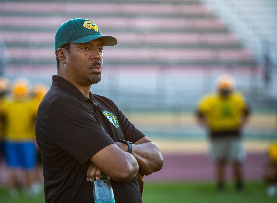 Head Coach Bill Johnson watches his team during a seven on seven drill in practice at Coachella Valley High School in Thermal, Calif., Friday, Aug. 4, 2023. 