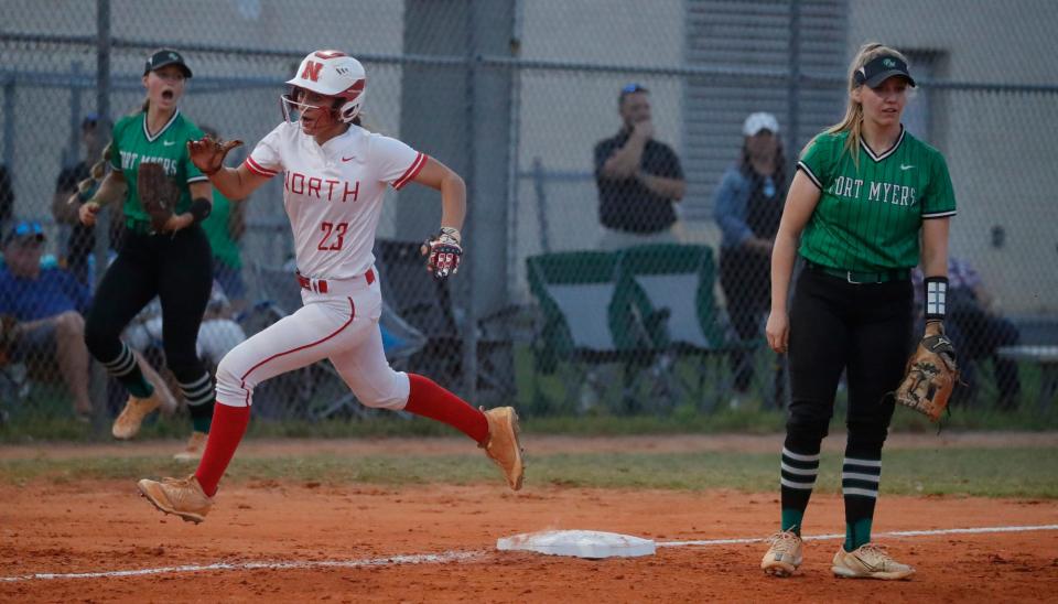 North Fort Myers catcher Mia Lane runs past third base on her way to score after hitting an infield home run with two runners on base in the fourth quarter. The North Fort Myers High School varsity softball team dominated Fort Myers and went on to win the District 5A-11 championship game Thursday, May 4, 2023, with a final score of 11-1.