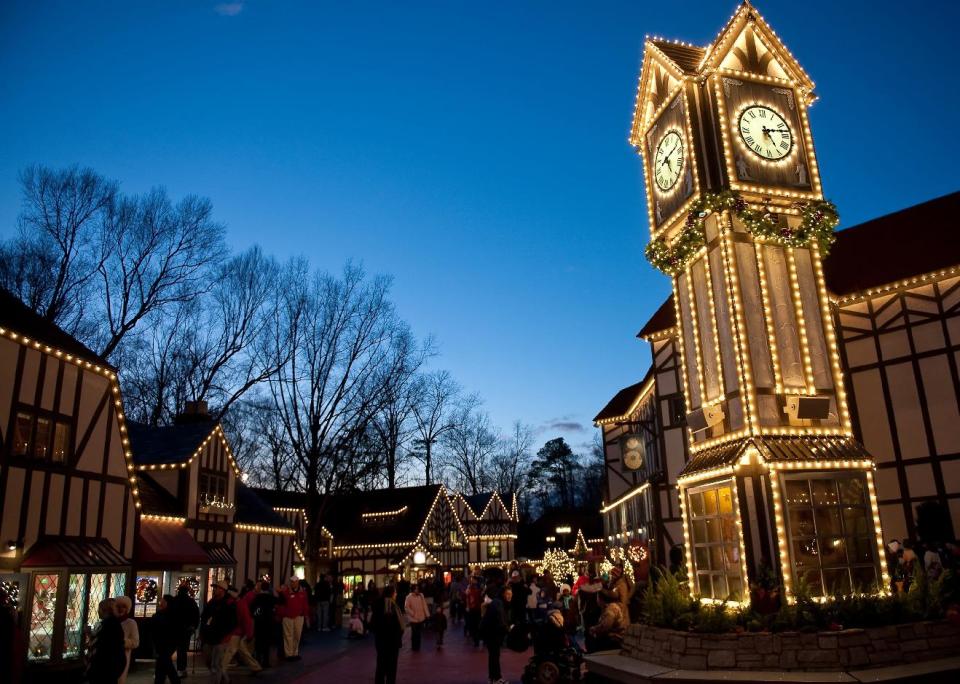 This Nov.2011 photo provided by Busch Gardens Williamsburg shows the theme park’s Christmas Town, which returns this year for a fourth season, with six million lights adorning nearly every building. The display includes 1,500 trees, 700 wreaths and 20,000 ornaments, plus shows, Santa’s workshop and a 50-foot-tall animated tree dancing to synchronized music. (AP Photo/SeaWorld Parks & Entertainment)