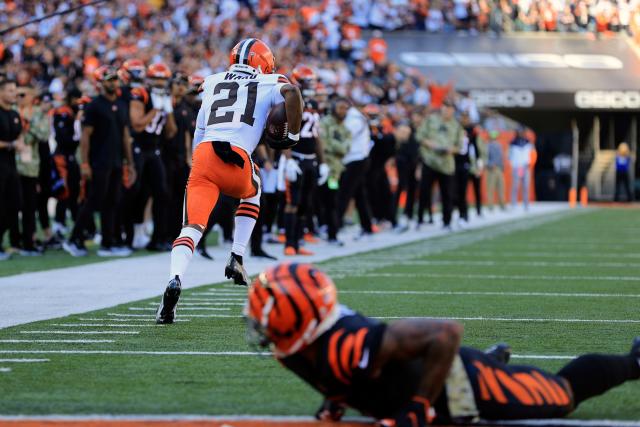 Kansas City Chiefs safety Juan Thornhill (22) makes an interception  intended for Cincinnati Bengals wide receiver Ja'Marr Chase (1) during an  NFL football game, Sunday, Dec. 4, 2022, in Cincinnati. The play