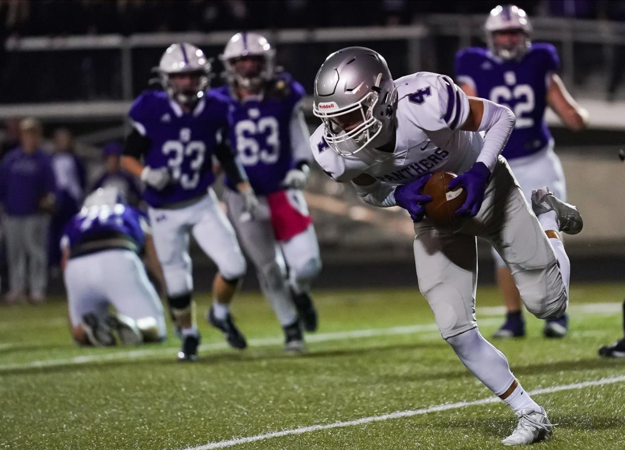 Bloomington South’s Drew Crum-Hieftje (4) intercepts a pass during the IHSAA sectional championship football game at Seymour on Friday, Nov. 3, 2023.