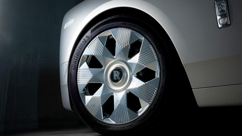 Perhaps the most apparent new exterior design cues are the wheels, whose triangular facets are 3-D milled from solid stainless. - Credit: James Lipman, courtesy of Rolls-Royce Motor Cars.