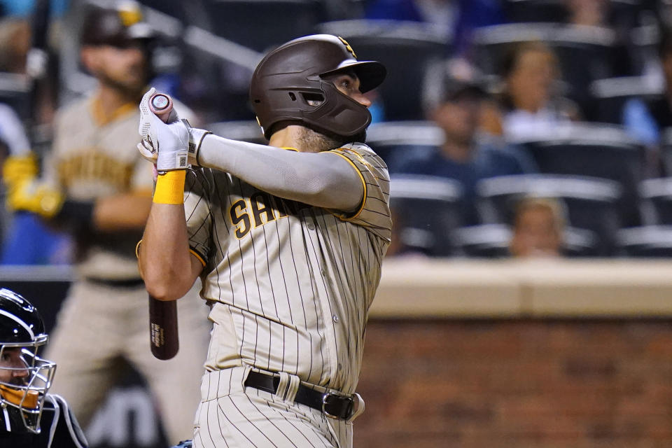 San Diego Padres' Eric Hosmer watches his two-run home run against the New York Mets during the fourth inning of a baseball game Friday, July 22, 2022, in New York. (AP Photo/Frank Franklin II)