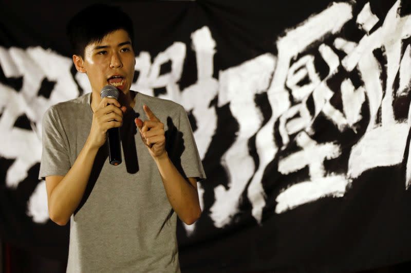 FILE PHOTO: Former student leader Lester Shum speaks during a protest in support of the student leaders who were imprisoned for their participation of the 2014 pro-democracy Umbrella Movement, in Hong Kong