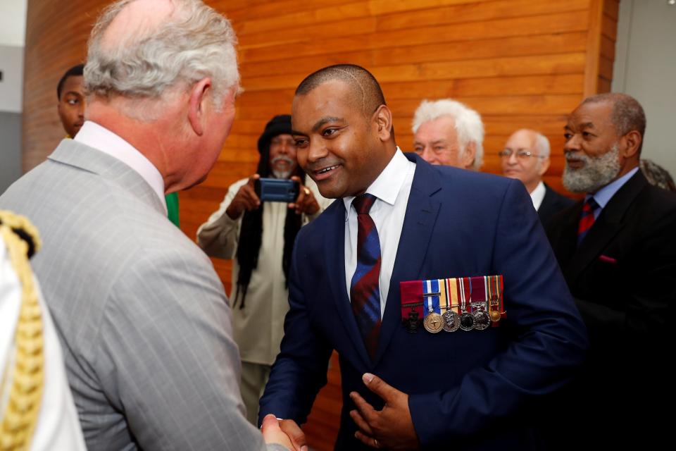 Lance Sergeant Johnson Beharry met Prince Charles on the royal's visit to Grenada (REUTERS)