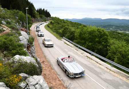 Oldtimer Mercedes cars are seen driving in Imotski, Croatia, May 19, 2019. REUTERS/Antonio Bronic
