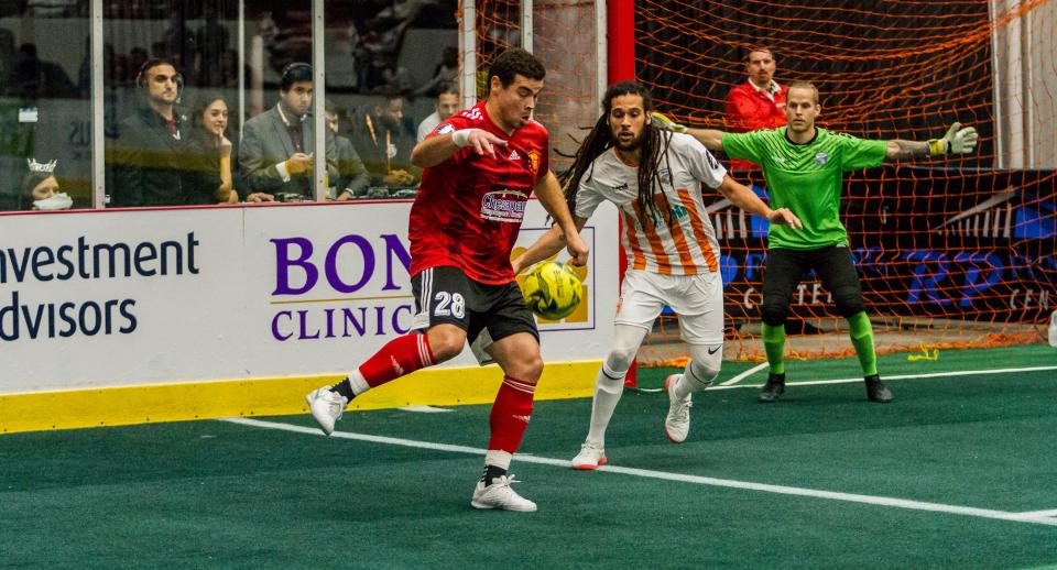 Then-Baltimore Blast's Vini Dantas, left, competes vs. the Florida Tropics at the RP Funding Center in Lakeland, Florida on Saturday Dec. 21 2019 in a MASL regular-season game. Dantas recently signed a two-year deal with the Florida Tropics.