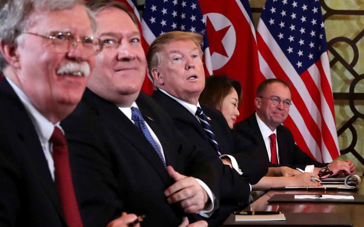 Pompeo, second from left, said that the presence of US diplomatic staff at the embassy has become a constraint on US policy - REUTERS