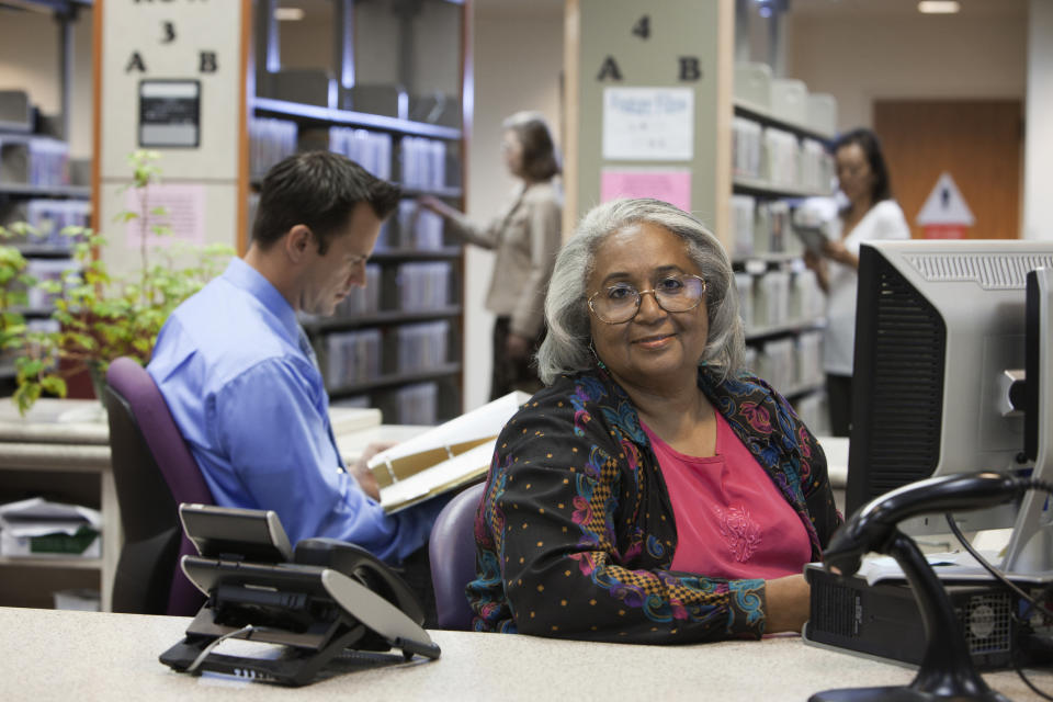 People working in a library