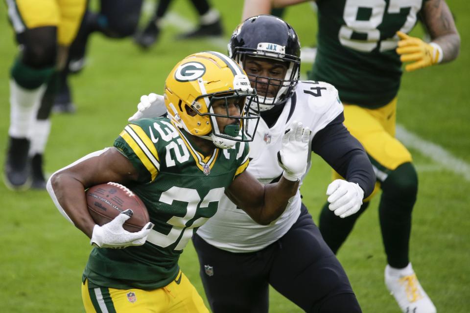 Green Bay Packers' Tyler Ervin runs during the first half of an NFL football game against the Jacksonville Jaguars Sunday, Nov. 15, 2020, in Green Bay, Wis. (AP Photo/Mike Roemer)