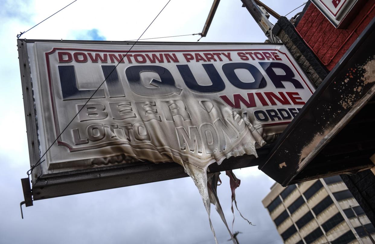 The aftermath of Tuesday's late-evening fire at Downtown Party Store on 428 S. Washington Square, seen Wednesday, April 3, 2024. According to LFD, the fire started arout 11:36 p.m. The store suffered $200,000 in property damage and an estimated $50,000 in losses to contents.