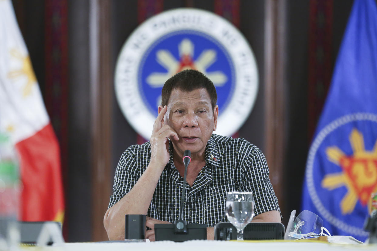 In this photo provided by the Malacanang Presidential Photographers Division, Philippine President Rodrigo Duterte speaks at the Malacanang presidential palace in Manila, Philippines on Thursday Oct. 8, 2020.  (Albert Alcain/Malacañang Presidential Photographers Division via AP)