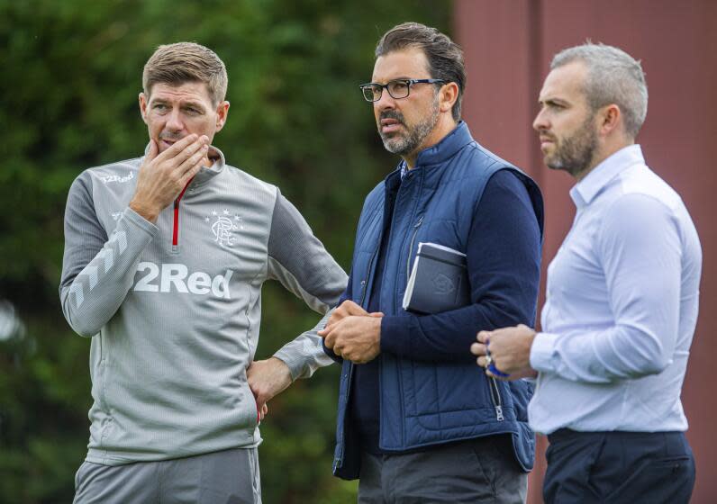 Galaxy technical director Jovan Kirovski joins Rangers manager Steven Gerrard to watch a training session