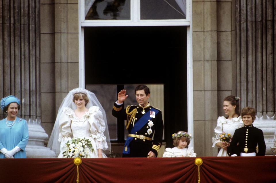 Princess Diana and Prince Charles with the Queen on their wedding day (PA )