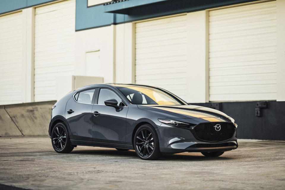 This photo provided by Mazda shows the 2023 Mazda 3, a compact hatchback that can be had with all-wheel drive and a powerful turbo engine. (Courtesy of Mazda North American Operations via AP)