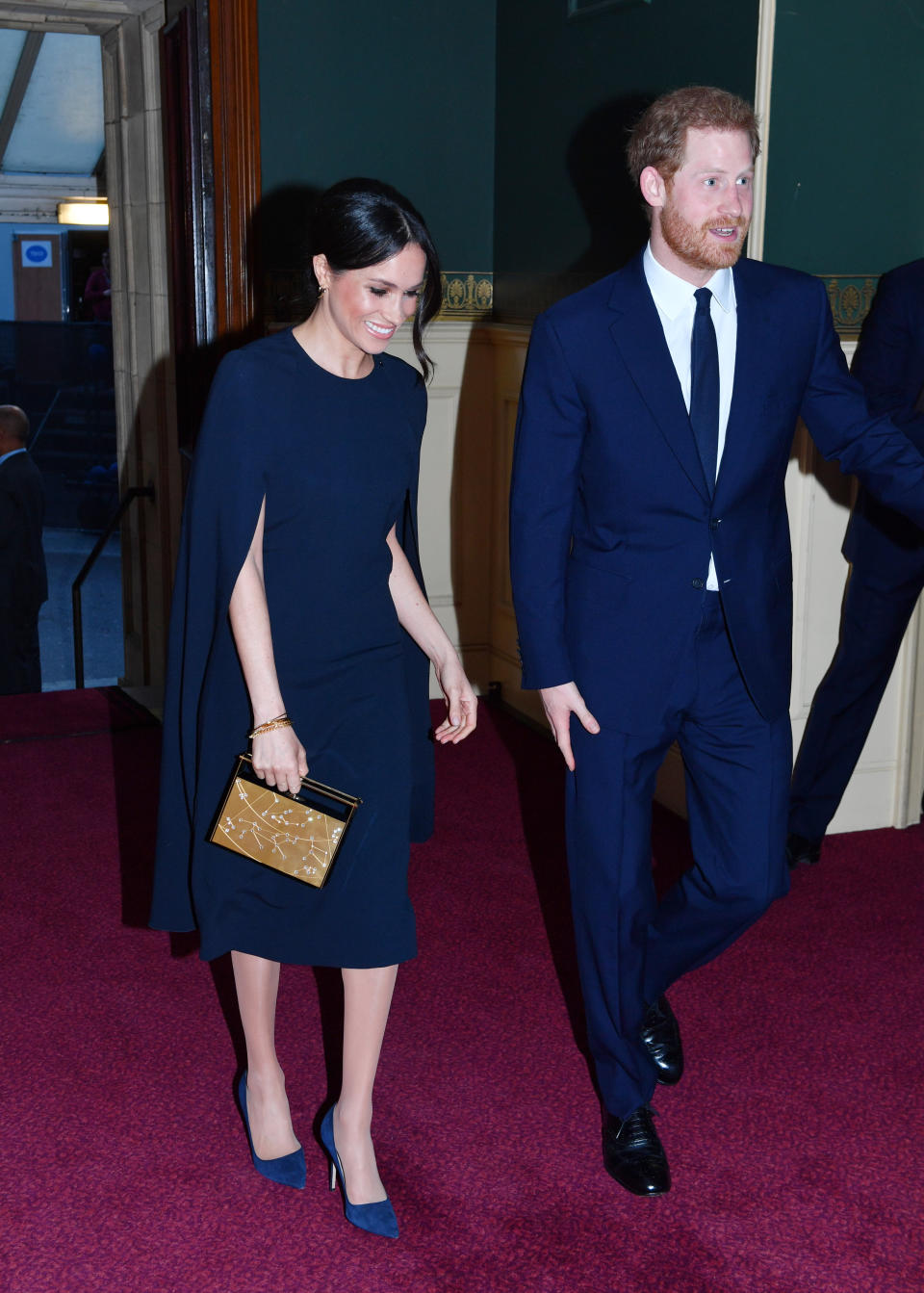 The Duke and Duchess of Sussex arrive at Royal Albert Hall to attend a star-studded concert to celebrate the queen's 92nd birthday on April 21 in London.