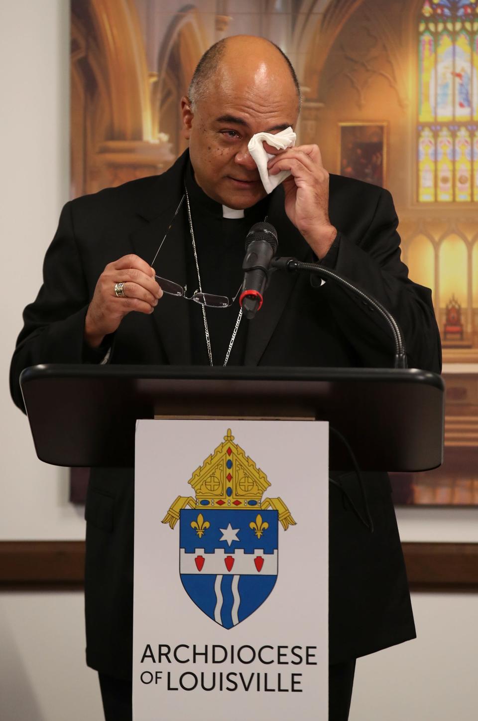 Archbishop Shelton Fabre makes pauses during remarks as he is introduced as the Archbishop of Louisville.  Fabre was remembering the people of Louisiana who he served before coming to Louisville.