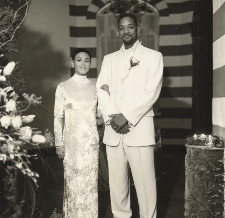 Jada Pinkett Smith and Will Smith pose for a photo on their wedding day.