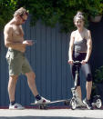 <p>Michelle Monaghan and husband Peter White take five during a scooter ride on Friday in L.A.</p>