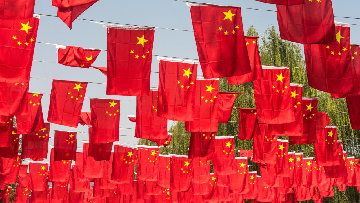  Flags of the People's Republic of China, hanging in a park during National Day in Beijing, China. 