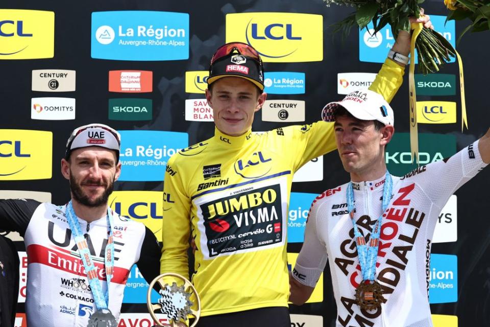 LtoR Second place overall in the race Adam Yates (USA),  first place Jonas Vingegaard (Jumbo-Visma) and third place Ben OConnor (AG2R Citroen) on the podium