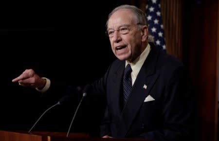 FILE PHOTO: U.S. Senate Judiciary Committee Chairman Senator Chuck Grassley (R-IA) speaks during a news conference to discuss the FBI background investigation into the assault allegations against U.S. Supreme Court nominee Judge Brett Kavanaugh on Capitol Hill in Washington, U.S., October 4, 2018. REUTERS/Yuri Gripas/File Photo