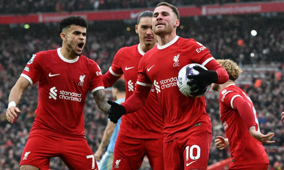 <span>Alexis Mac Allister celebrates with the ball after scoring the equaliser from the penalty spot. </span><span>Photograph: John Powell/Liverpool FC/Getty Images</span>