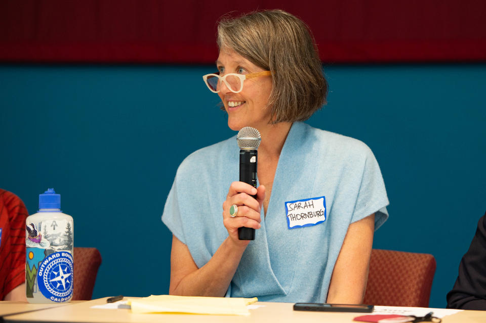 Asheville City Schools Board of Education Candidate Sarah Thornburg speaks a forum at A-B Tech on April 22, 2022.