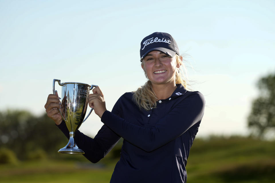 AJGA champion Gianna Clemente poses for a photo after the final round of the Mizuho Americas Open golf tournament, Sunday, May 19, 2024, in Jersey City, N.J. Clemente won the amateur portion of the event. (AP Photo/Seth Wenig)