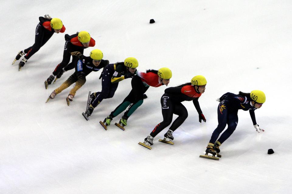 SHANGHAI, CHINA - DECEMBER 08: (L-R) Jessica Hewitt of Canada, Marie-Eve Drolet of Canada, Biba Sakurai of Japan, Deanna Lockett of Australia, Bernadett Heidum of Hungary, Valerie Maltais of Canada, Ha-Ri Cho of Korea compete in the Women's 1500m Semi final during the day one of the ISU World Cup Short Track at the Oriental Sports Center on December 8, 2012 in Shanghai, China. (Photo by Hong Wu/Getty Images)