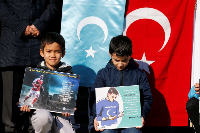 Ethnic Uighur demonstrators attend a protest against China in Istanbul