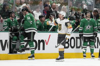 Vegas Golden Knights right wing Jonathan Marchessault (81) celebrates his first period goal in front of the Dallas Stars bench during Game 2 of an NHL hockey Stanley Cup first-round playoff series in Dallas, Wednesday, April 24, 2024. (AP Photo/Tony Gutierrez)