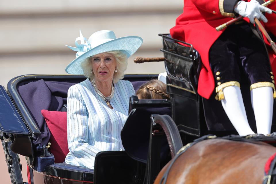 Camilla, Duchess of Cornwall, rides in a carriage during the Trooping the Colour parade.