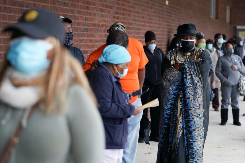 Early voters queue to cast their votes in Georgia