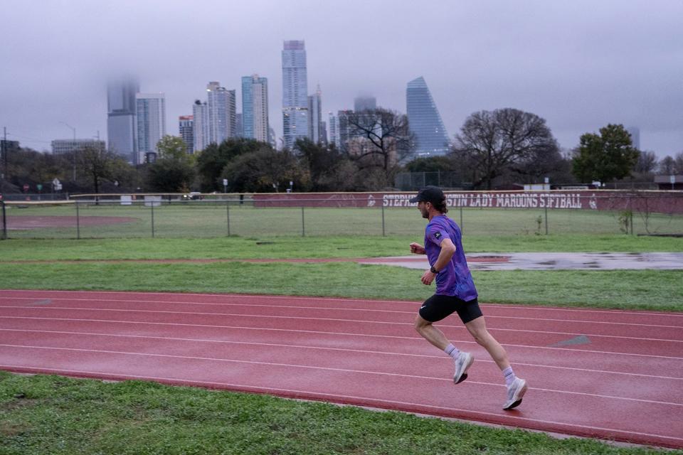 Mitch Ammons trains at Austin High on Tuesday. Ammons, a local runner recovering from drug addiction, recently qualified for the U.S. Olympic Marathon Trials. He has been sober for over seven years now.