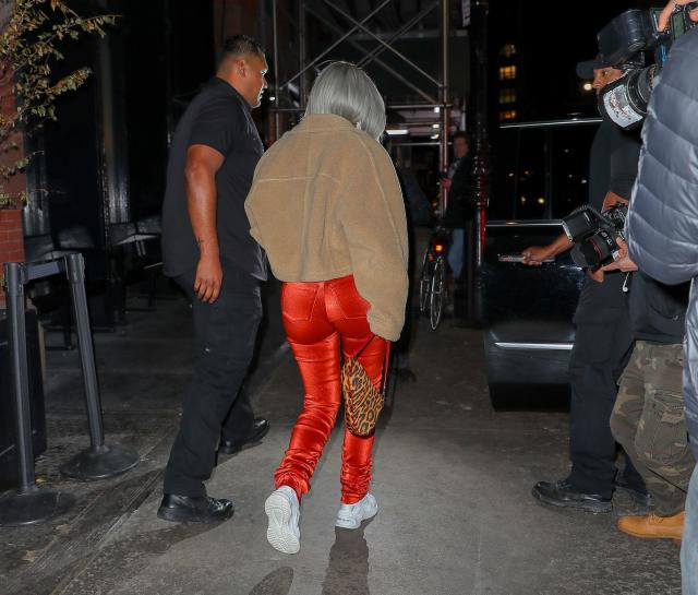 Shop Kylie Jenner's Metallic Orange Pants - GRAZIA USA