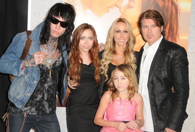 Tish and Billy Ray Cyrus, and their children Trace, Brandi and Noah, arrive at the Los Angeles premiere of 
