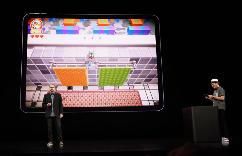 Konami brand manager Benjamin Kinney demos “Frogger in Toy Town,” a reimagining of the classic game available only on Apple Arcade. Image: Apple 