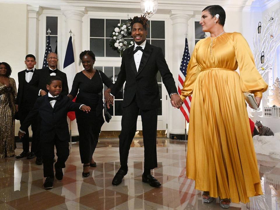 Jon Batiste, his wife writer Suleika Jaouad and family arrive at the White House to attend a state dinner honoring French President Emmanuel Macron, in Washington, DC, on December 1, 2022