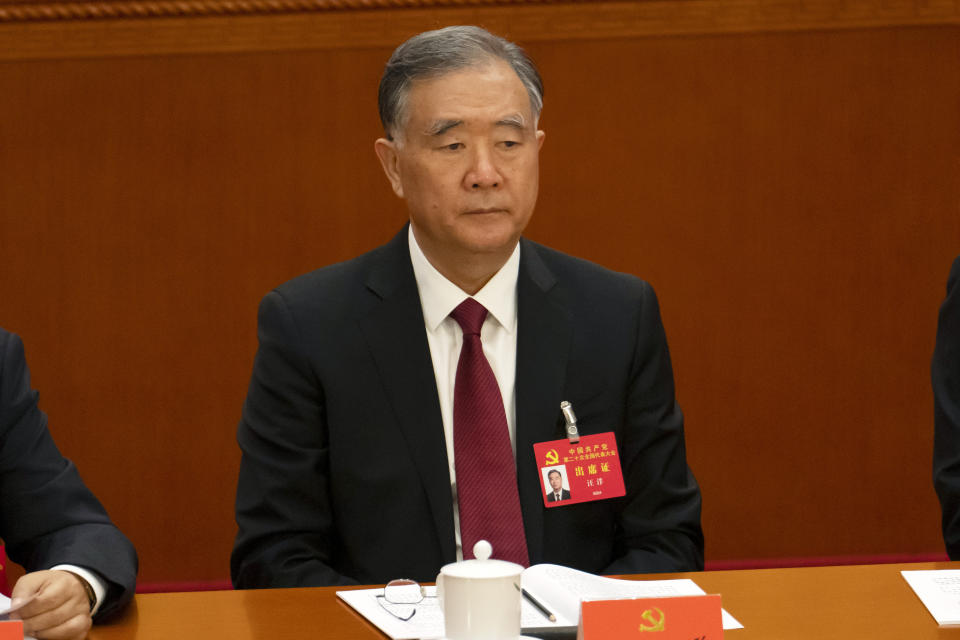 Politburo Standing Committee member Wang Yang attends the opening ceremony of the 20th National Congress of China's ruling Communist Party at the Great Hall of the People in Beijing, China, Sunday, Oct. 16, 2022. While Xi Jinping is primed to receive a third five-year term as head of China's ruling Communist Party at this week's congress, new members of the party's leading bodies are expected to be appointed at the meeting, whose proceedings are mainly held behind closed doors. (AP Photo/Mark Schiefelbein)