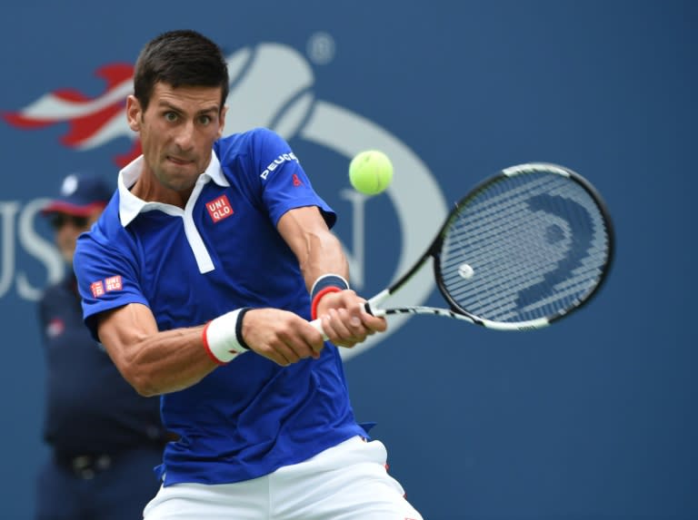 Novak Djokovic returns a shot to Joao Souza during their US Open match at the USTA Billie Jean King National Tennis Center on August 31, 2015