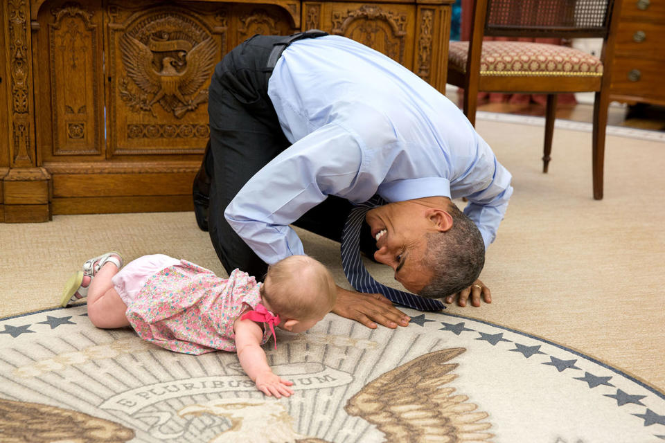 <p>“At the President’s insistence, Deputy National Security Advisor Ben Rhodes brought his daughter Ella by for a visit on June 4, 2015. As she was crawling around the Oval Office, the President got down on his hands and knees to look her in the eye.” (Pete Souza/The White House) </p>