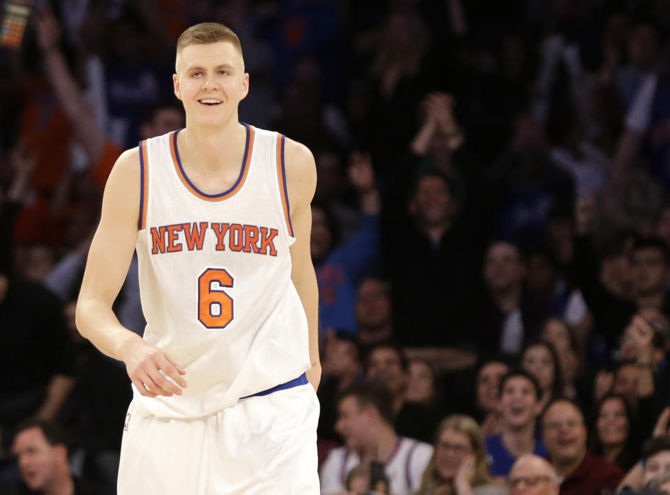 Kristaps Porzingis smiles after putting away another crook. Or hitting a shot. Whichever. (AP)