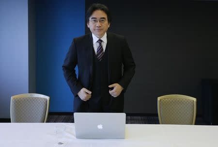 Nintendo Co's President and Chief Executive Satoru Iwata attends an interview with Reuters in Tokyo in this file May 8, 2014 photo. REUTERS/Toru Hanai