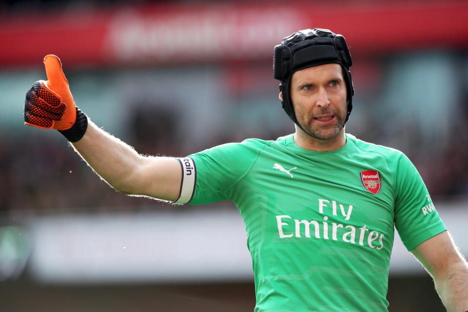 Cech salutes the Arsenal fans after a double save in the first half